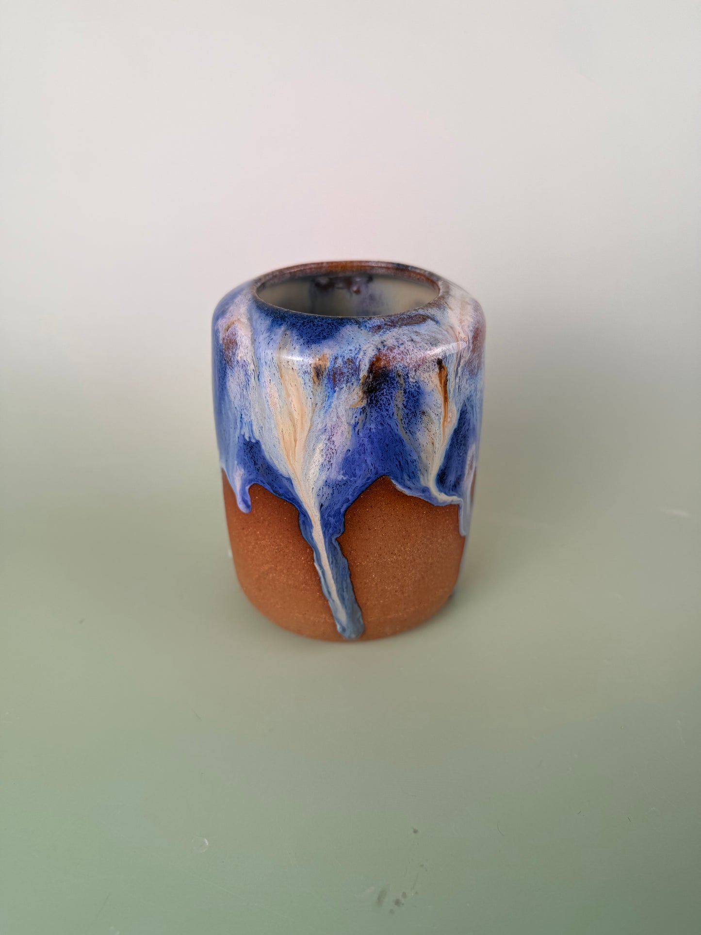 Dark clay drippy glaze