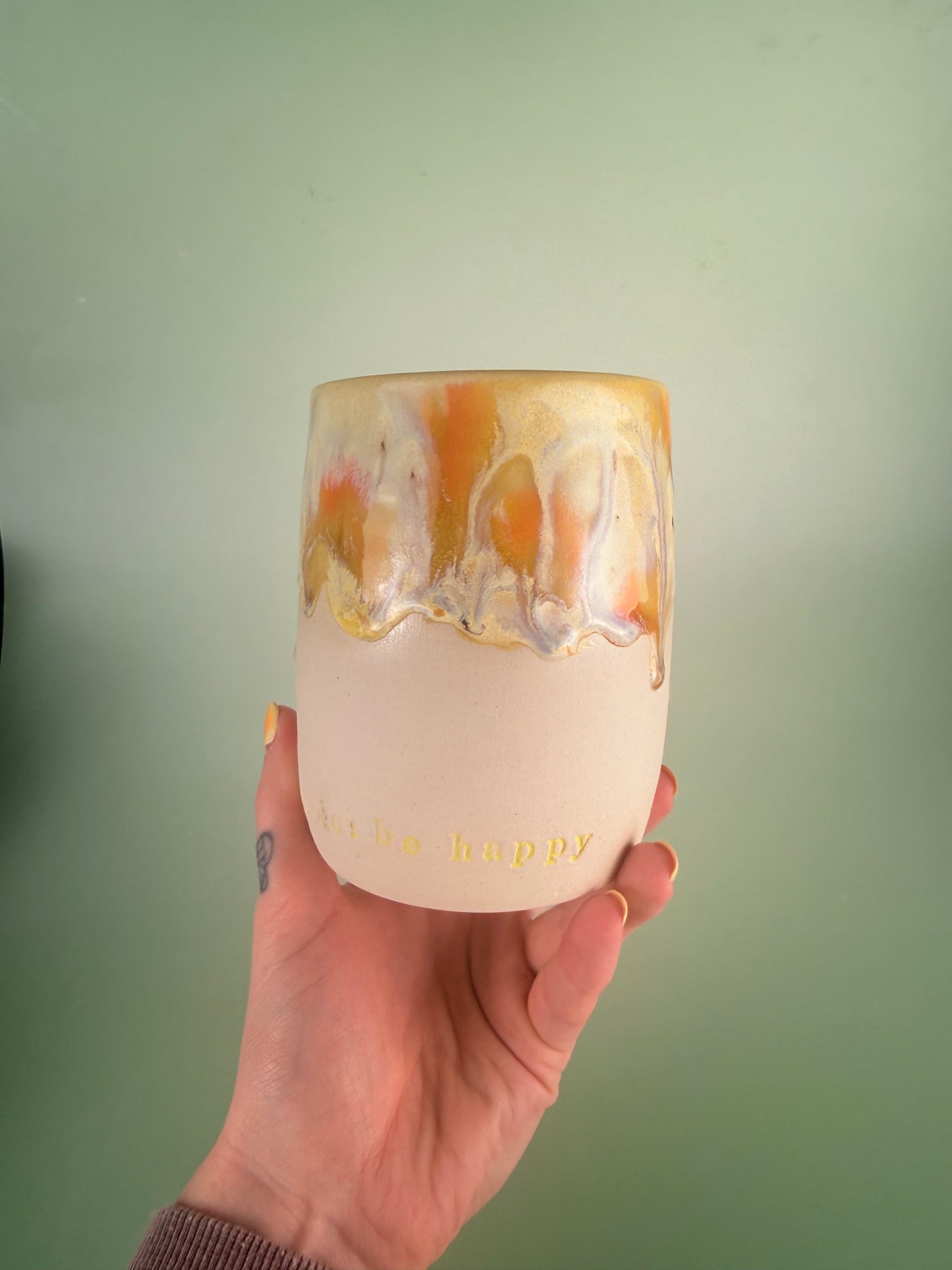 Yellow drippy “to do: be happy”