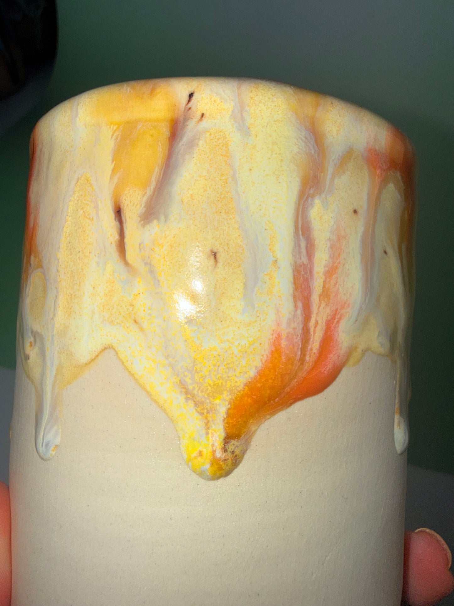 Yellow drippy travel cup