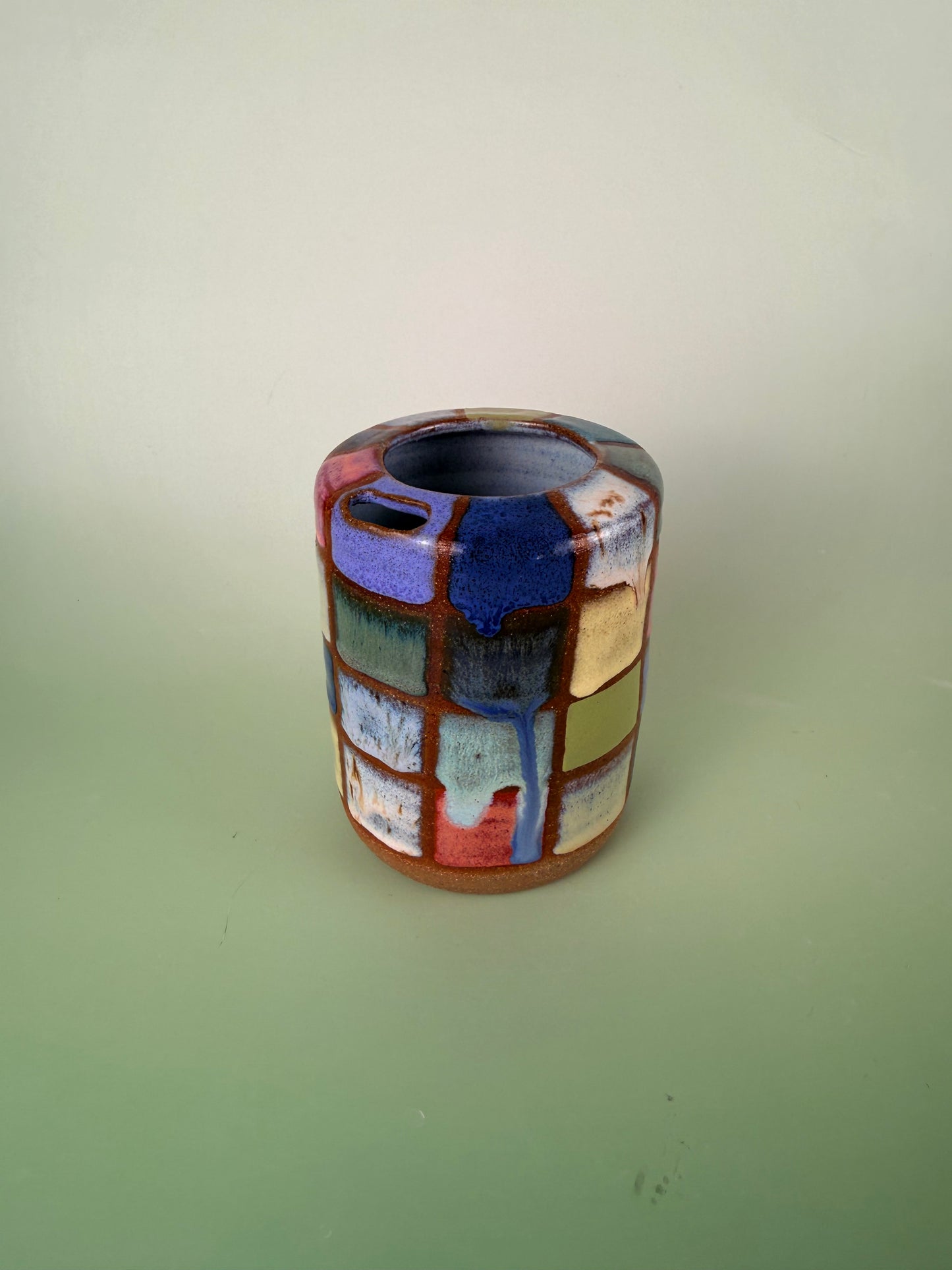 Dark clay checkered cup