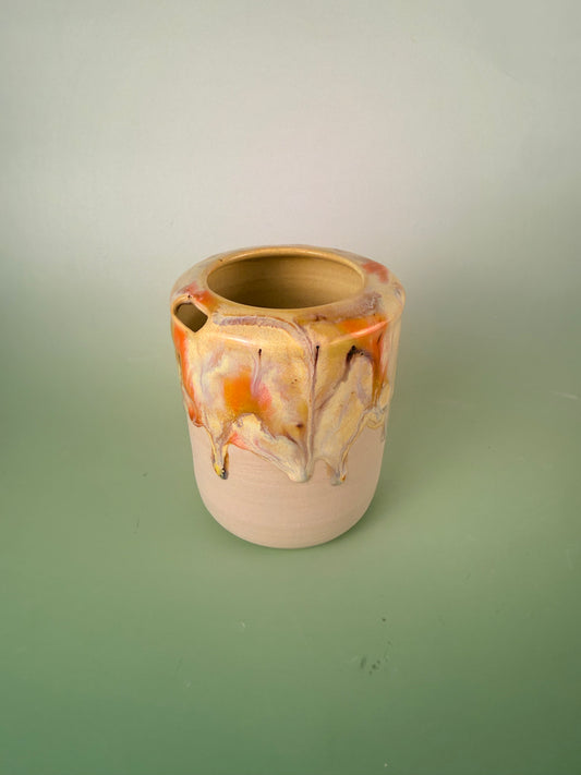 Yellow drippy travel cup