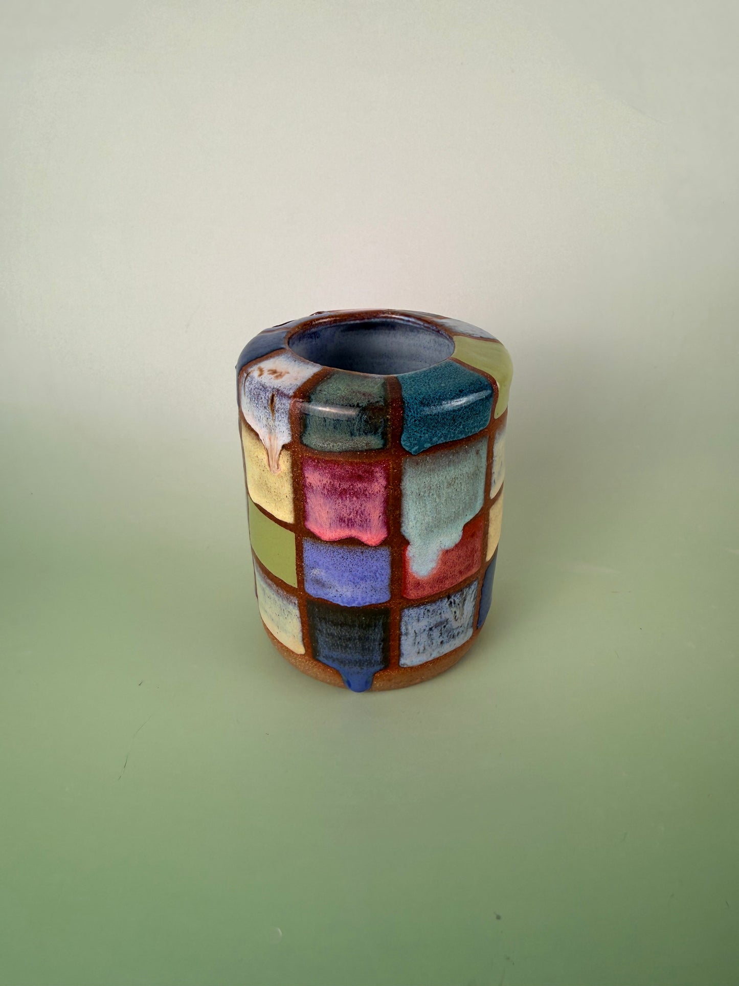 Dark clay checkered cup