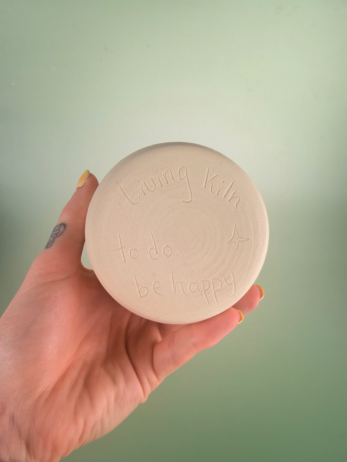 Yellow drippy “to do: be happy”