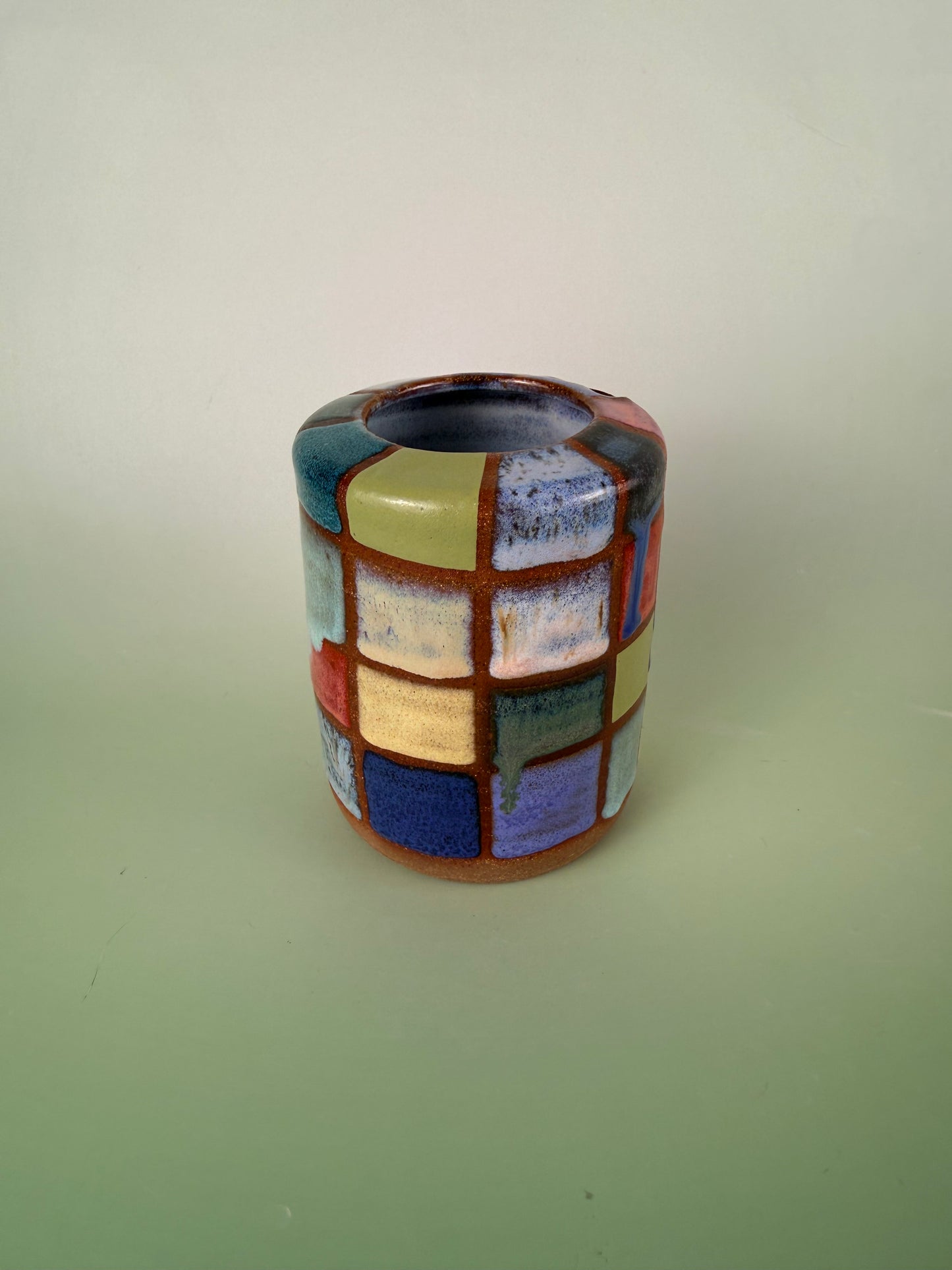 Dark clay checkered cup