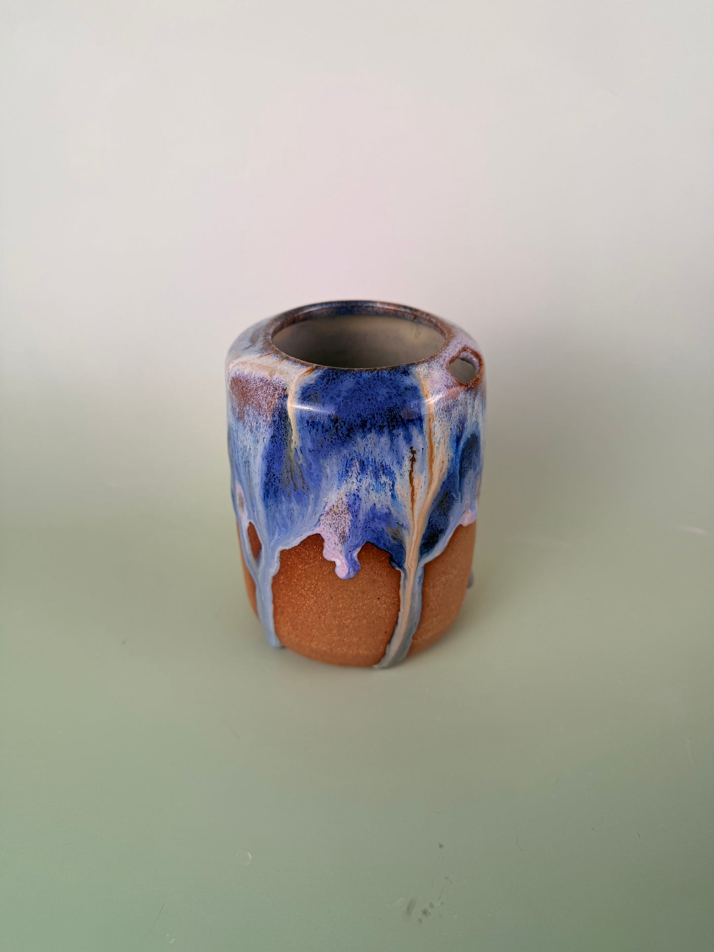 Dark clay drippy glaze